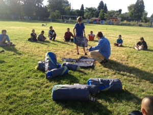 Jeremy Dodge instructs sixth-graders at the Denver Green School on the set up of the Mountainsmith Conifer 5+