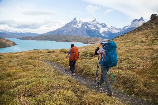 Two men hiking in Parque Torres Del Paine, Patagonia with the Mountainsmith Apex 60, Apex 80, Rhyolite and Pyrite trekking poles