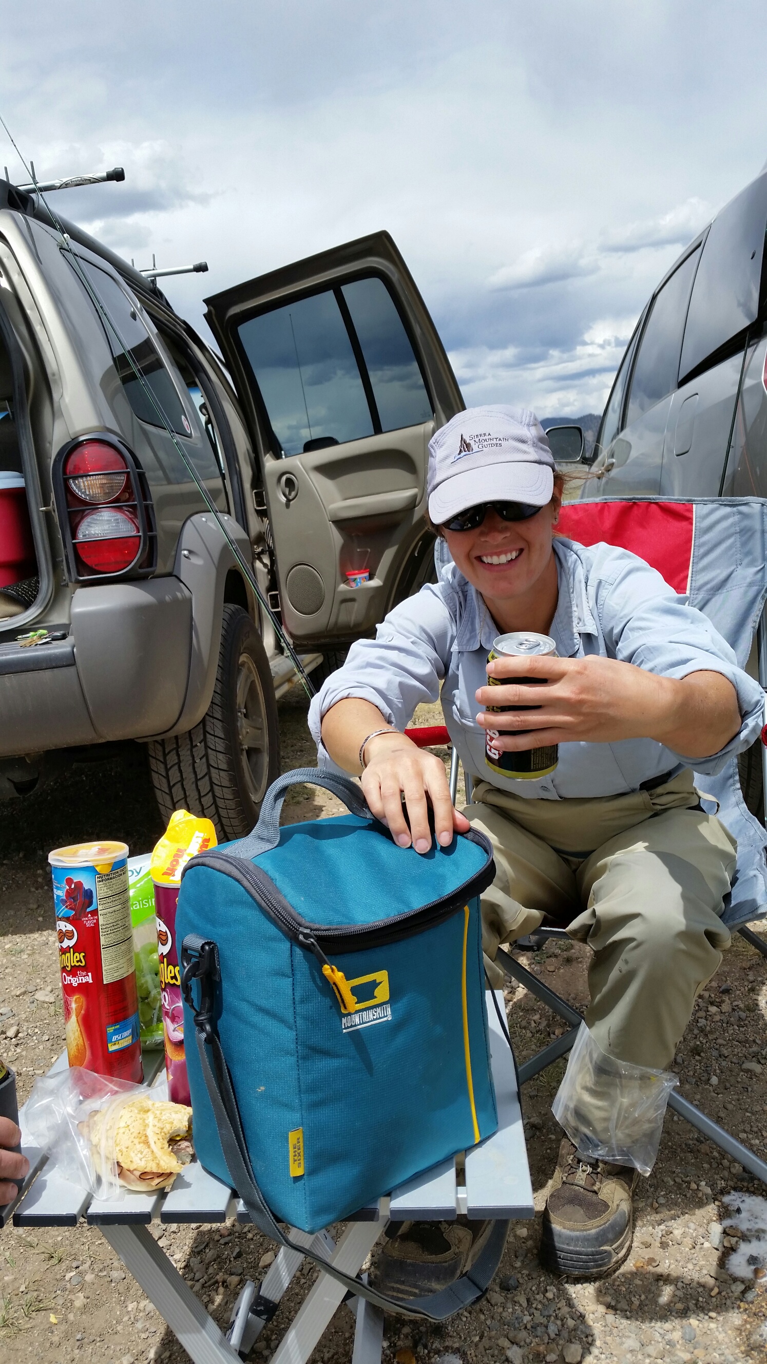 Here, Ashley helps serve up a cold one from The Sixer from Mountainsmith, after a day of fishing the Dream Stream, aka the South Platte River in Colorado