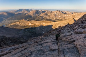 Girl climbing up section of Long's Peak, Colorado