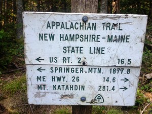 Appalachian trail sign at the new hampshire maine state line