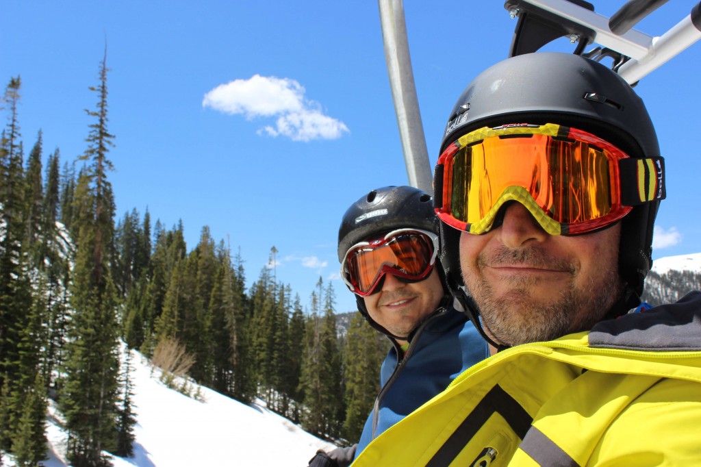 Andy Held and Stephen Serna ride the quad chairlift at arapahoe basin ski resort