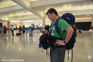 Josh Wilson of Peanuts or Pretzels using his Mountainsmith Lariat backpack and Tour FX at the airport