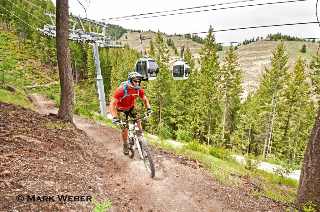 Elijah Weber mountain biking the River Run Trail on Bald Mountain under the Roundhouse Gondola at Sun Valley Resort near the city of Ketchum in central Idaho