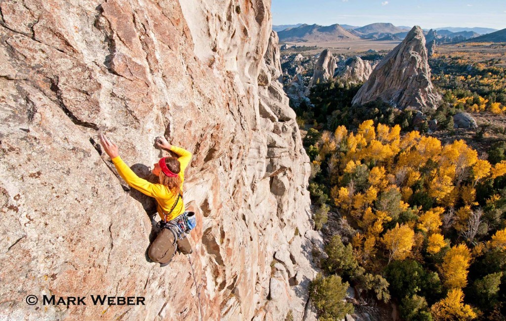Nic Houser rock climbing a route called Shes The Bosch which is rated 5,11 and located on Window Rock at The City Of Rocks National Reserve near the town of Almo in southern Idaho