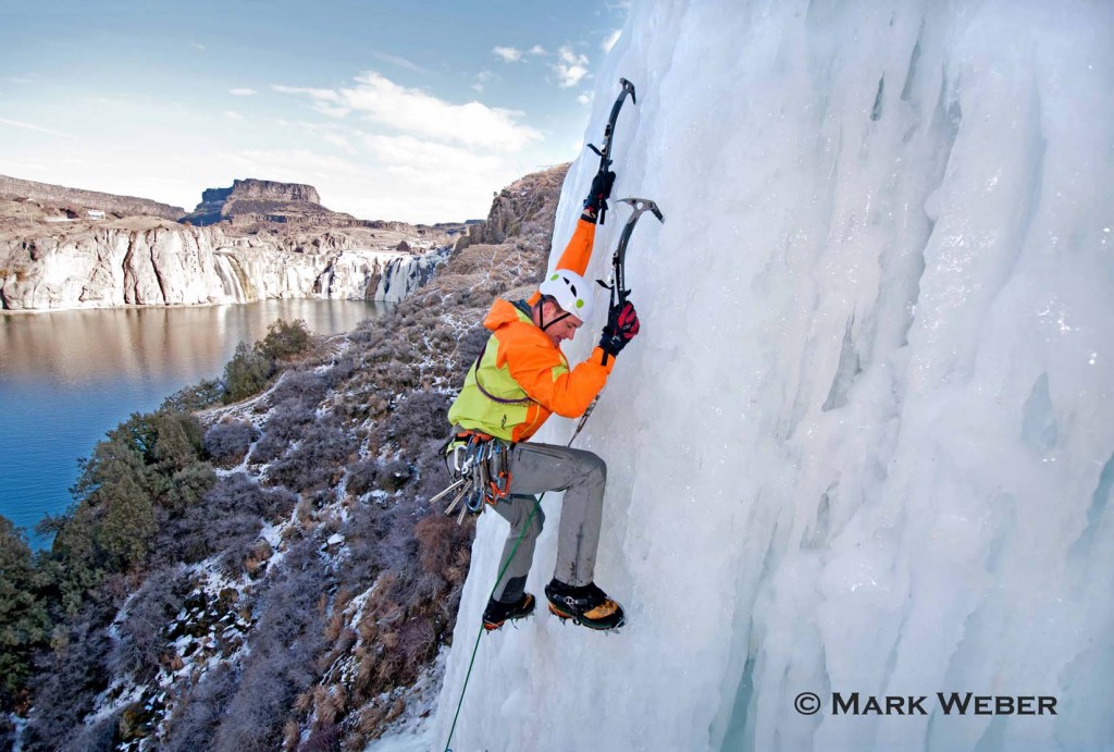 Elijah Weber ice climbing Lower Falls Right which is rated WI-4 and located at Shoshone Falls in the Snake River Canyon near the city of Twin Falls in southern Idaho