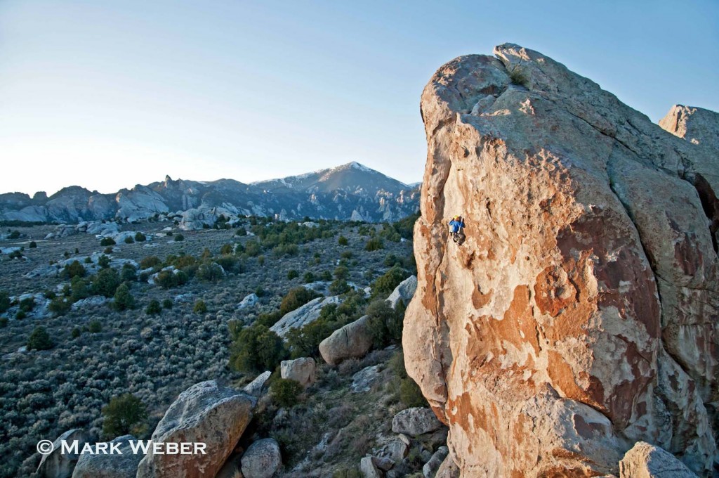 Nic Houser rock climbing a route called Fido which is rated 5,11 and located on the Electric Avenue formation at The City Of Rocks National Reserve near the town of Almo in southern Idaho