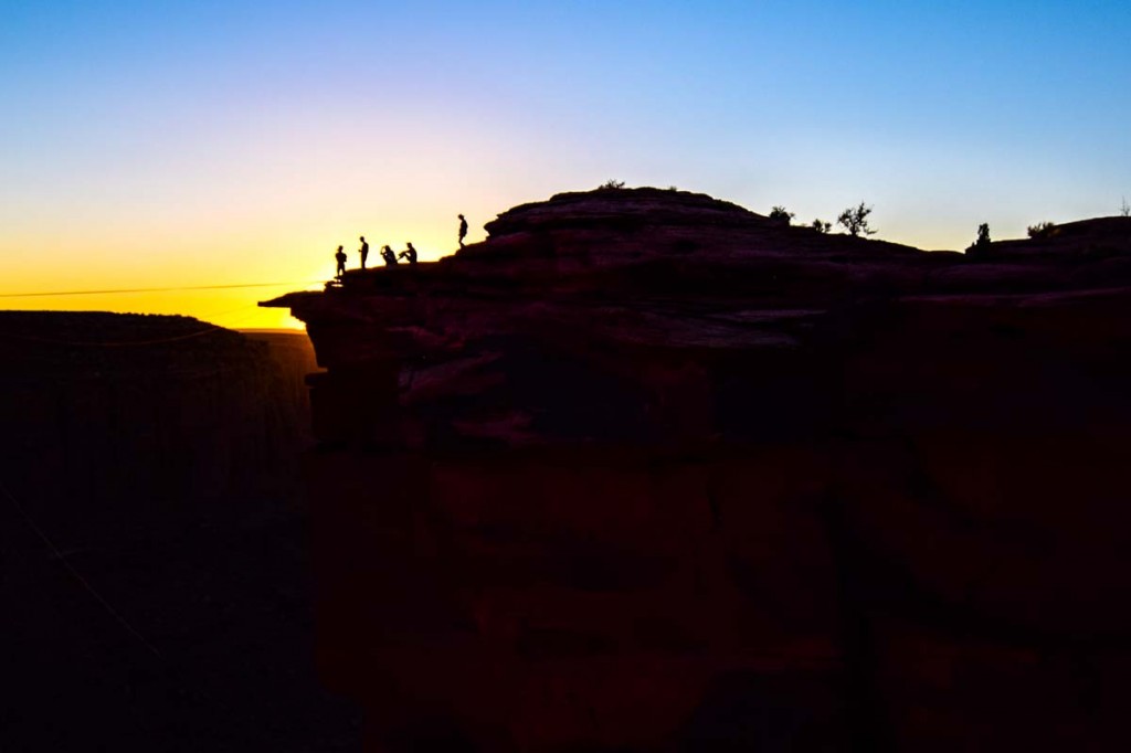 minons on the edge of the canyon in moab at the fruit bowl at sundown