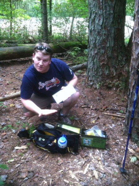 Josh Wilson of Peanuts or Pretzels discovers a Geocache with his Mountainsmith Tour