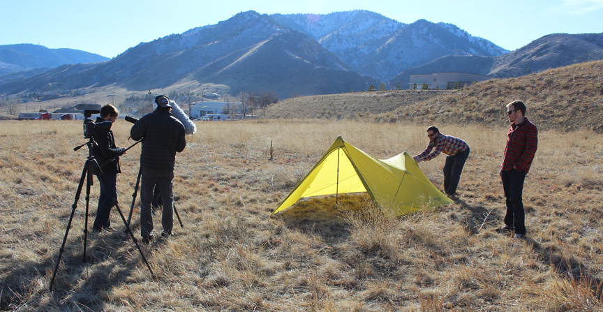 The crews from Mountainsmith and Three Strings Productions ready the set of for the Mountain Shelter LT