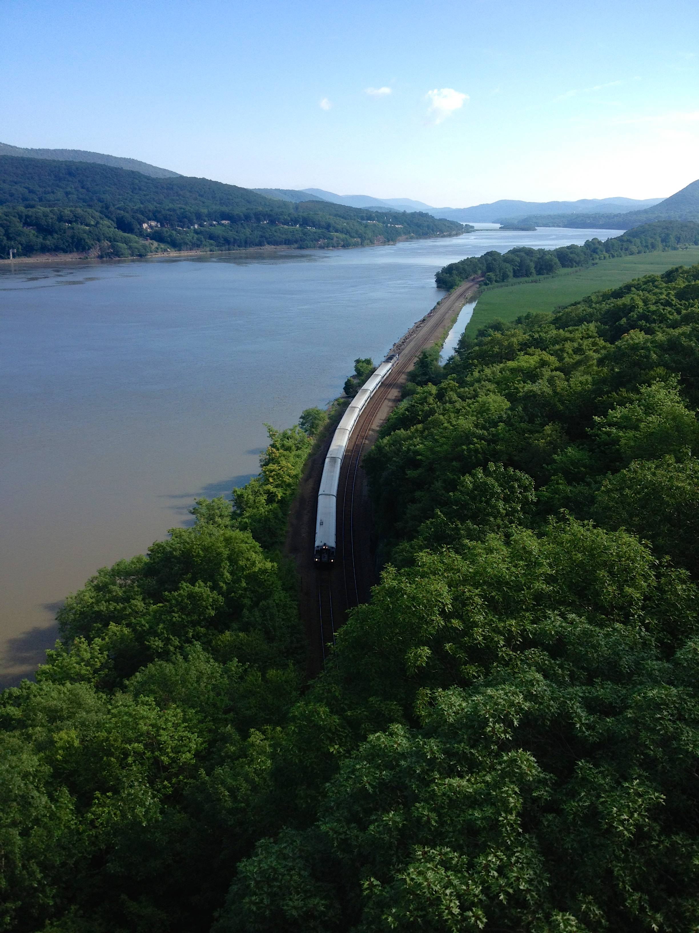 A look down from the Hudson River Bridge in Bear Mountain, NY at the commuter train heading to New York City.