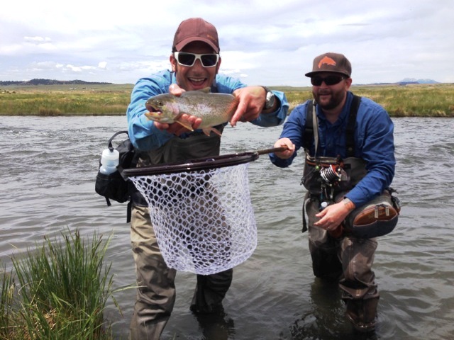 Jay Getzel, Mountainsmith President holds up a cutbow trout on the South Platte River in Colorado