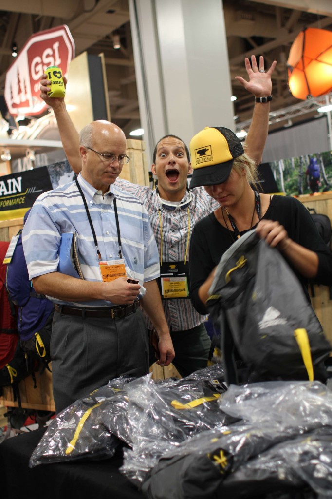 Jay Getzel and Stacy Gerths selling backpacks 