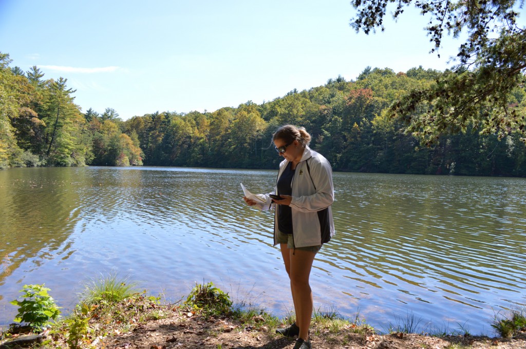 Liz Wilson of Peanuts or Pretzels examines her geocaching map