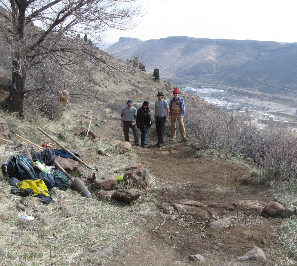 Jenifer Briseno, Luke Boldman, Stephen Serna, and Jeremy Dodge at the location of their trail work on North Table Mountain in Golden, Colorado
