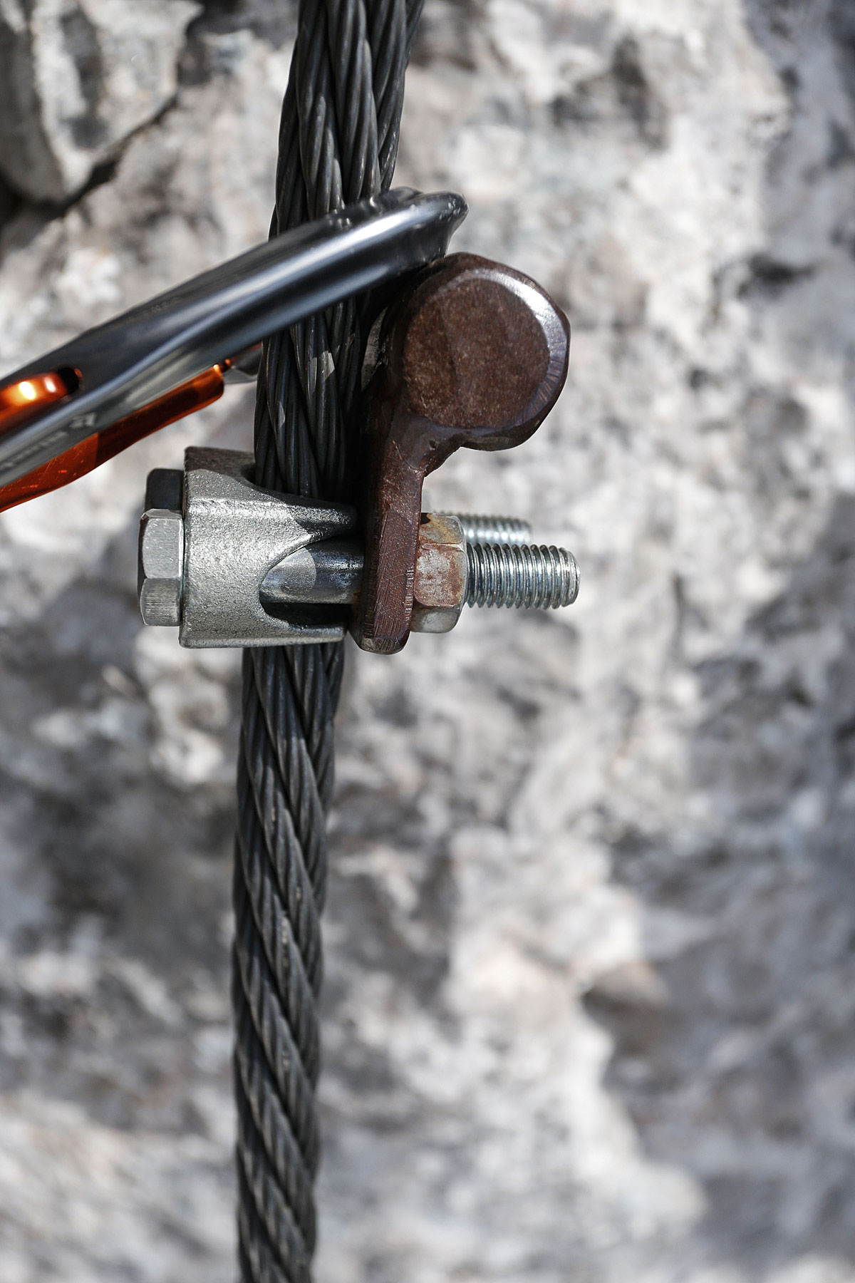 Cable and pins on the via Ferrata in Italy