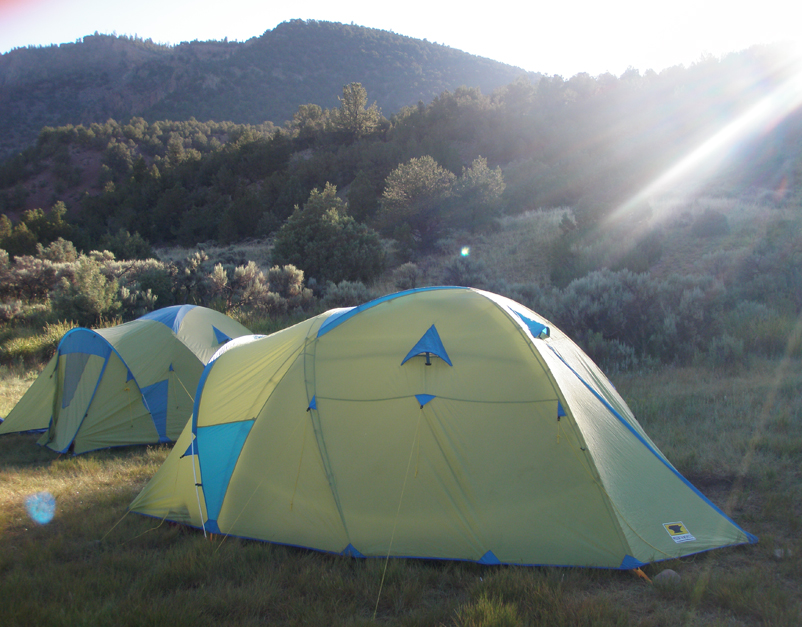 Two Mountainsmith Conifer 5+ tents set up on the side of the Colorado River