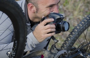 Aaron codling taking a close up photo of a mountain bike, by Curtis Savard