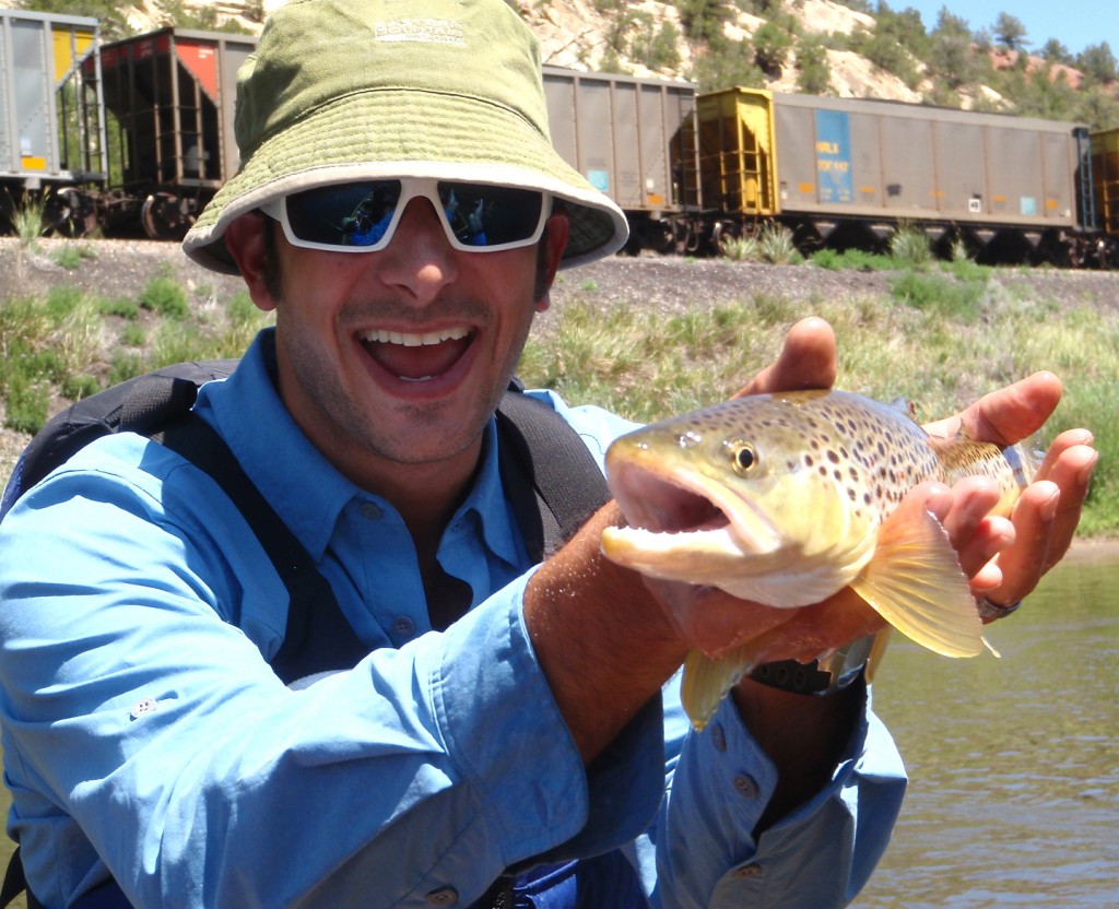 Mountainsmith's President Jay Getzel holding a Brown Trout on the Colorado River