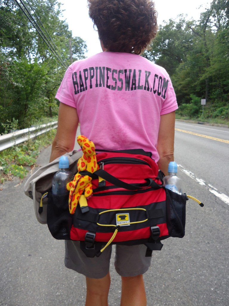 Linda Wheatley of the Happiness Walk carrying a Mountainsmith Day Fanny Pack