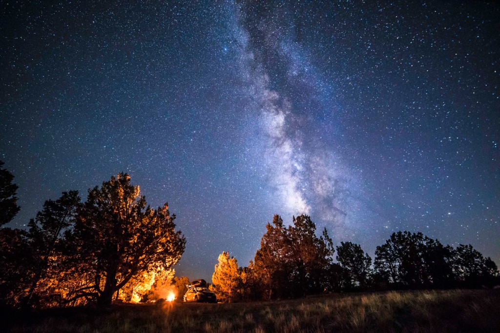 thw milky way with a campfire in the foreground