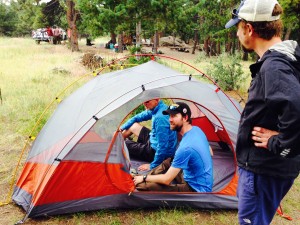 Mountainsmith designer Luke Boldman shows the new Mountain Dome 3 features to David Clucas and Peter Reese