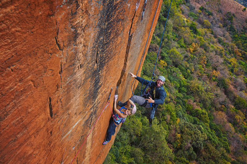 Andy Mann and Sasha DiGiulian climbing on Rolihala in Kruger National Park, South Africa