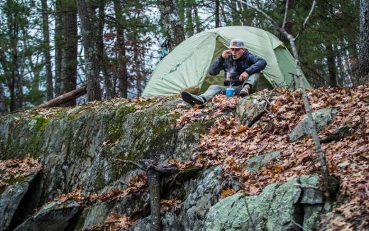 Man camping in Mountainsmith Vasquez Peak tent